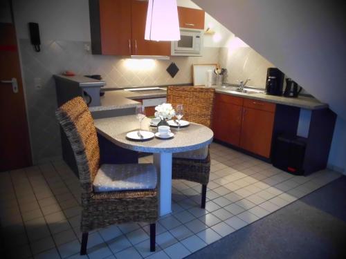 Kuchyň nebo kuchyňský kout v ubytování Apartments mit Flair