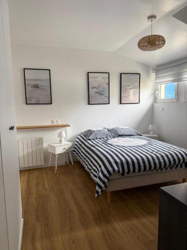 Llit o llits en una habitació de Ty-Kokoon