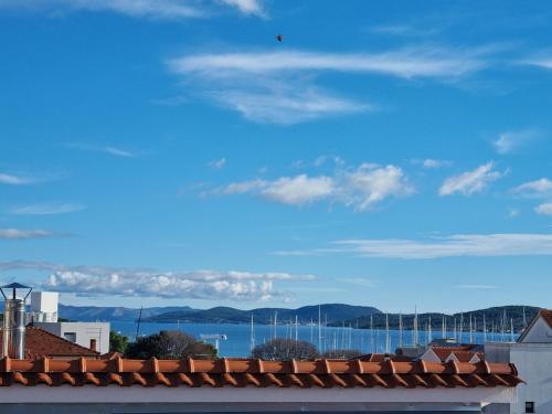 a view of the water from the roof of a building at Lion Apartments in Vodice