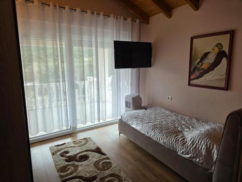 Llit o llits en una habitació de Guesthouse Micaj