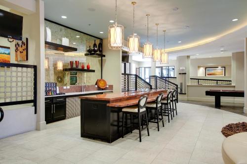 a large dining room with a long table and chairs at Landing Spectacular 1BD Clubhouse Gym in Charlotte
