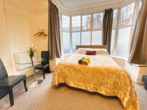 a bedroom with a bed with a toy truck on it at Central Southsea Studio, Perfect for work or Leisure, Central, Parking, self check-in, modern and comfortable in Portsmouth
