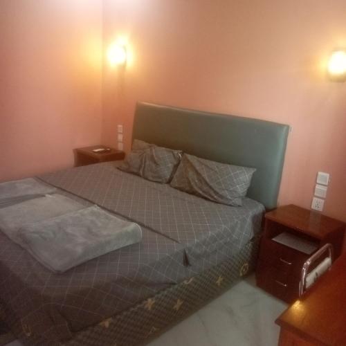 Postel nebo postele na pokoji v ubytování Hallo Hotel