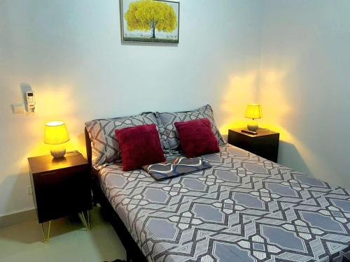 Llit o llits en una habitació de Appartement Moderne à Bingerville