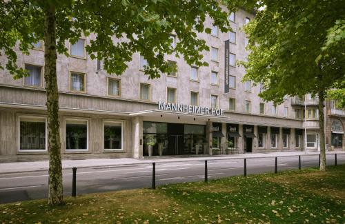a building with a sign on the front of it at Hotel Mannheimer Hof - Leonardo Limited Edition in Mannheim