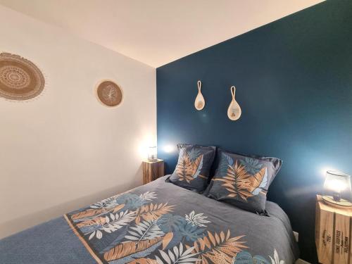 Llit o llits en una habitació de L'escale Charliendine