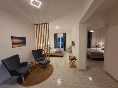 Krevet ili kreveti u jedinici u objektu Yianetta Hotel & Suites