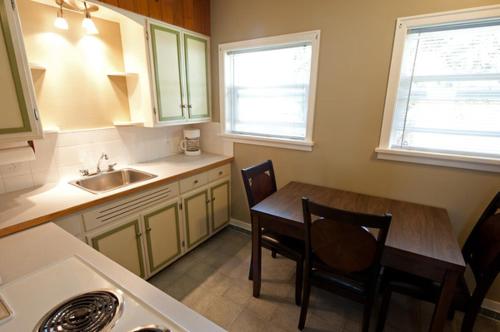 A kitchen or kitchenette at Alpine Inn & Suites