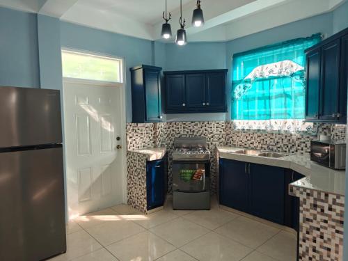 Kuchyň nebo kuchyňský kout v ubytování La Maison Corail