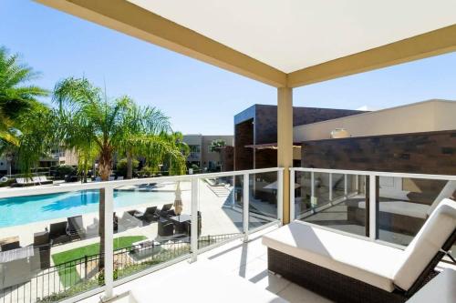an image of a balcony with a swimming pool at Marvelous 4 Bd Close to Disney @ Magic Village 3153 in Orlando