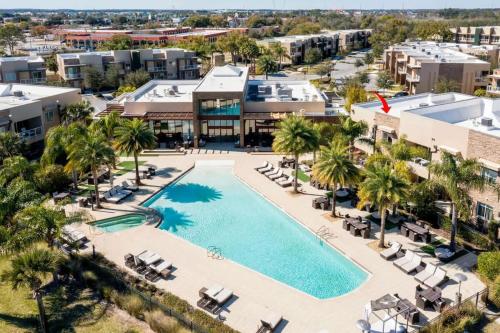 an aerial view of the pool at the resort at Marvelous 4 Bd Close to Disney @ Magic Village 3153 in Orlando
