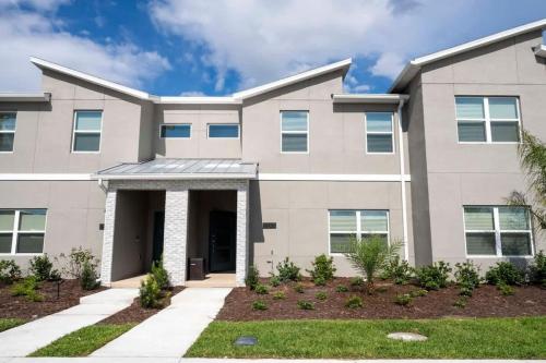 a rendering of a house with at Marvelous 4Bd with Pool at Storey Lake Resort 2601 in Kissimmee
