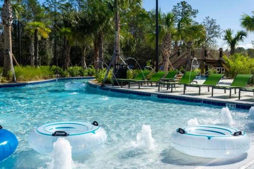 a pool at a resort with a water park at Gorgeous 4Bd with Pool at Storey Lake Resort 4475 in Kissimmee