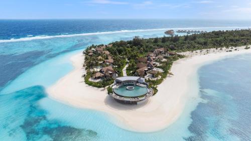 an aerial view of an island in the ocean at Six Senses Kanuhura in Lhaviyani Atoll