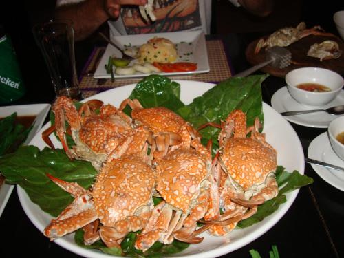 a plate of lobsters on a salad on a table at Andaman Sunflower in Ko Lanta