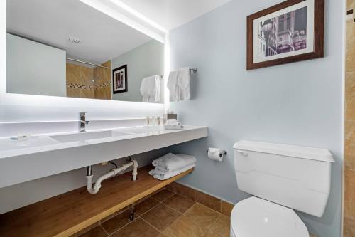 a bathroom with a sink and a toilet at Radisson Hotel Philadelphia Northeast in Trevose