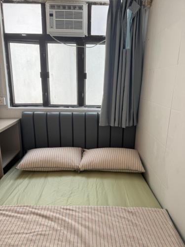 Llit o llits en una habitació de 旅居2wubin