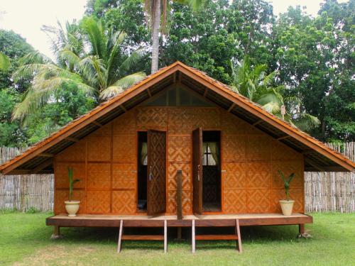 Zahrada ubytování Archery-Asia Nipa Huts Moalboal