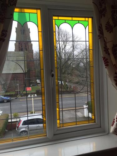 a window with a view of a street at Chester House Guest House in Chester