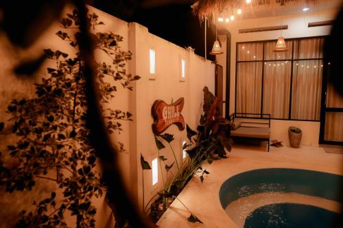 a bathroom with a jacuzzi tub in a building at Chill Tangalle in Tangalle