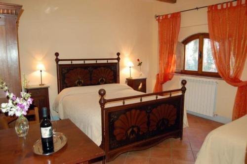 Katil atau katil-katil dalam bilik di Agriturismo Casanova