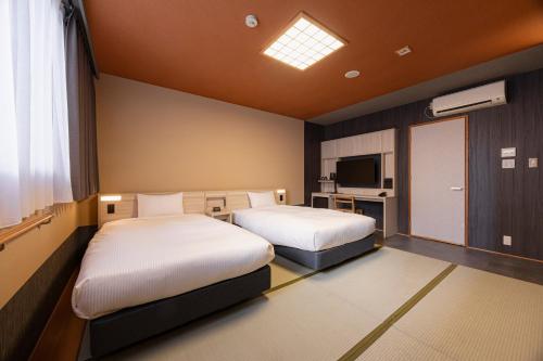 Quintessa Hotel Fukuoka watanabedori Comic&Books