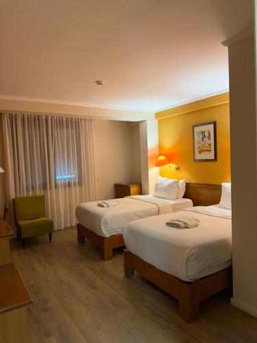 Postel nebo postele na pokoji v ubytování Arber Hotel