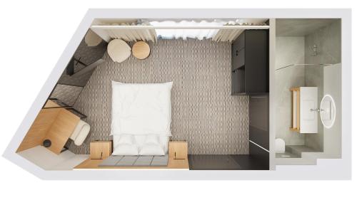a rendering of a small room with a bed at Hotel Verde City in Koszalin