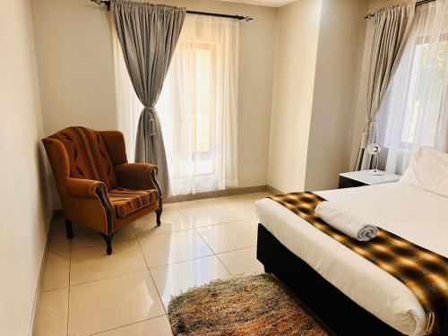 En eller flere senge i et værelse på Thetsane Ridge