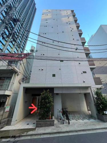 a building with a red x on the side of it at Nishishinjuku 902-SJ0367 in Tokyo