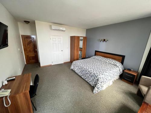 Llit o llits en una habitació de Pro Plus Suites