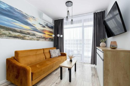 Ku Morzu Nadmorski Apartament w Pobliżu Plaży z Basenem i Parkingiem by Noclegi Renters
