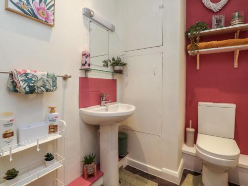 a bathroom with a sink and a toilet at Willow Wood in Settle