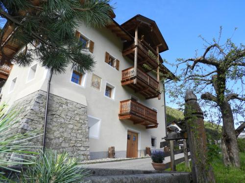 a house with balconies on the side of it at Hanslmoar Hof in Colli in Pusteria
