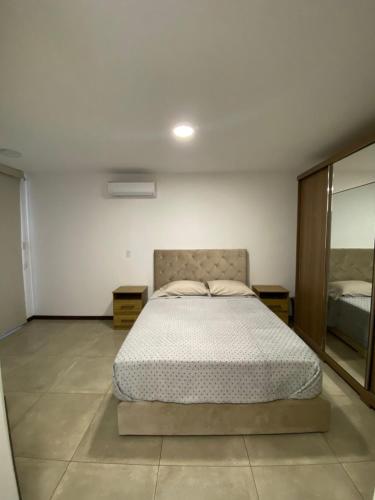 Llit o llits en una habitació de Curupau Roca