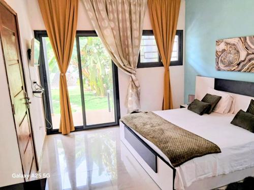 Llit o llits en una habitació de Casa Serena Saly