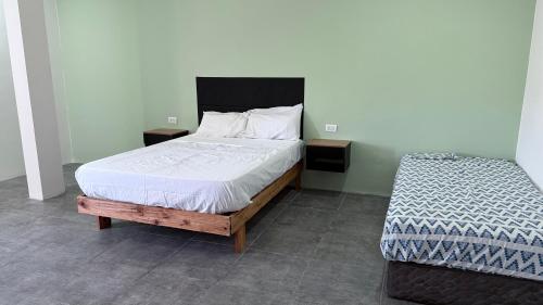 a bedroom with a large bed at Softi Sur in Comodoro Rivadavia
