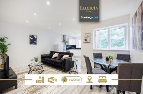 a living room with a couch and a table at Modern & Stylish 1BR By Luxiety Stays Short Lets & Serviced Accommodation Southend on sea Ideal For Business Trip in Southend-on-Sea