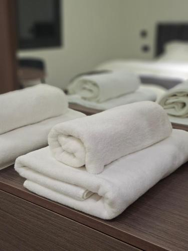 Krevet ili kreveti u jedinici u objektu Jeeso Hotel