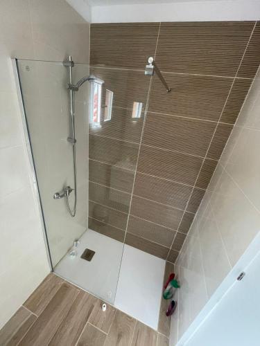 a shower with a glass door in a bathroom at La Playa in Adeje