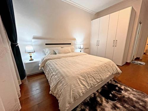 Guest house tesisinde bir odada yatak veya yataklar