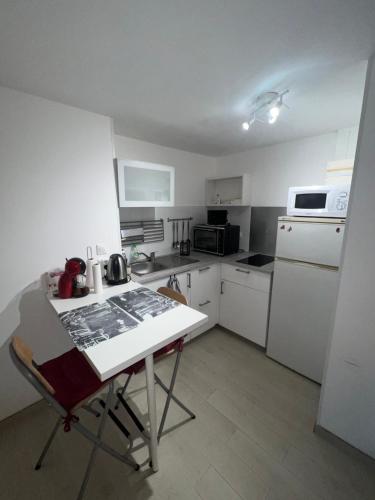 Cuina o zona de cuina de Apartment avec cours
