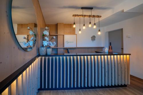 a lobby with a black and white railing at Agriturismo Hegemone in Tremosine Sul Garda