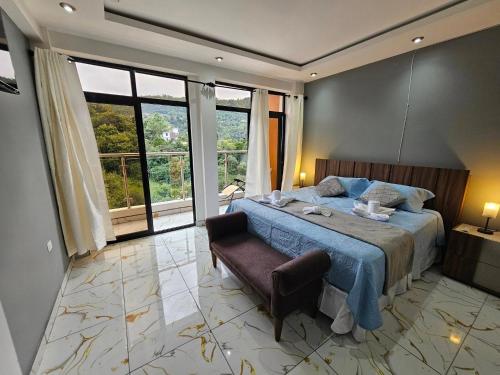 Llit o llits en una habitació de Hotel Kiara