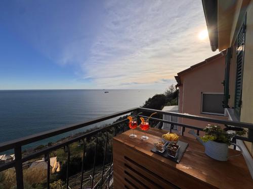a balcony with a view of the ocean at Marilú vista mare con giardino in Genoa