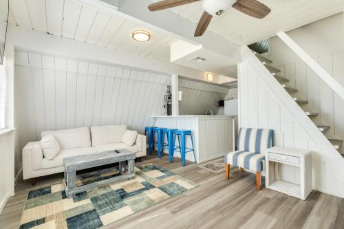 a living room with a couch and a table at Come Enjoy the Best Beach View in Surfside in Surfside Beach