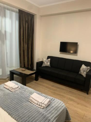 Postel nebo postele na pokoji v ubytování Luxe Apartment