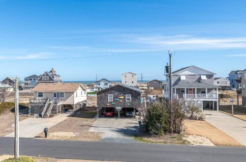 a view of a city with houses and a street at Key to Paradise - Kitty Hawk MP 4, Pool, Hot Tub, Excellent Ocean View, Easy Beach Access in Kitty Hawk
