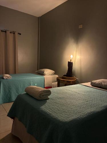 Llit o llits en una habitació de RodMar Hotel
