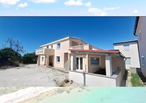 Apartmani Maslina Vir